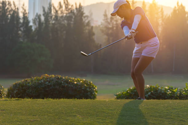Teeing off at sunrise